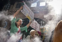 Photos show activists targeting billionaires in a street protest on the eve of New York Climate Week 922