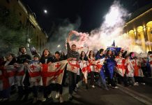 Opponents of Georgia’s ruling Dream Party take to the streets to protest against its election victory 171384986584220